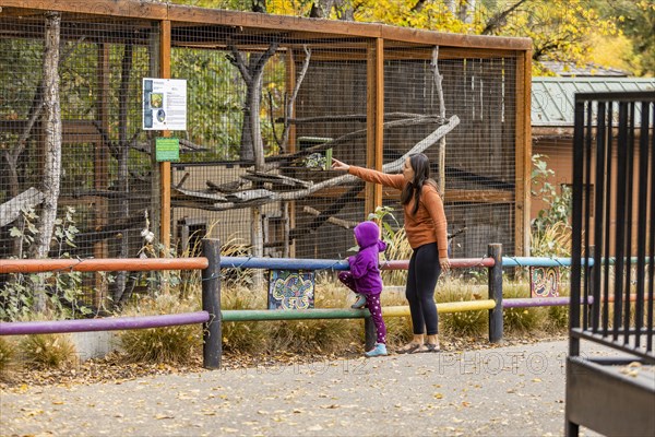 Mother and daughter visiting Boise Zoo