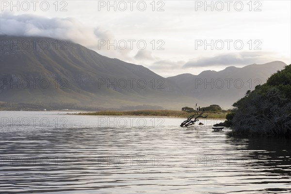 Lagoon and Klein mountains at sunset