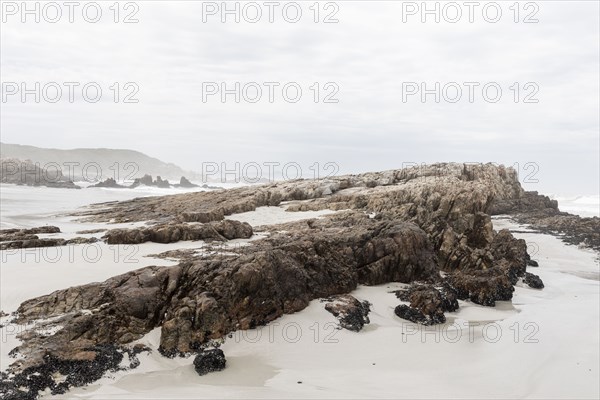 Rock formations on Voelklip Beach