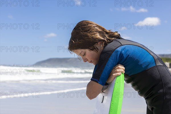 Boy with bodyboard on Grotto Beach