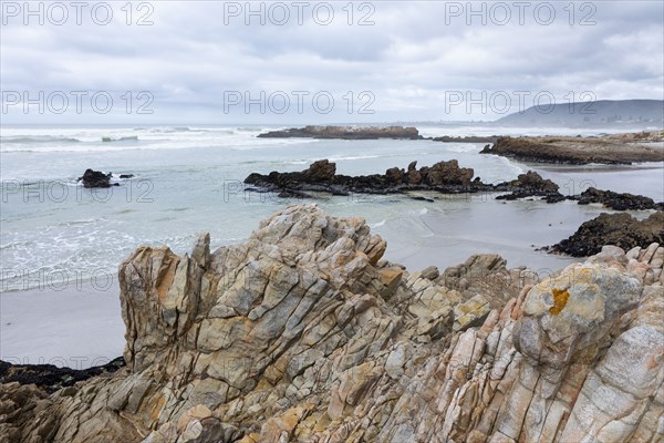 Rock formations on Voelklip Beach