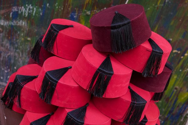 Traditional red Fez hats piled up for sale