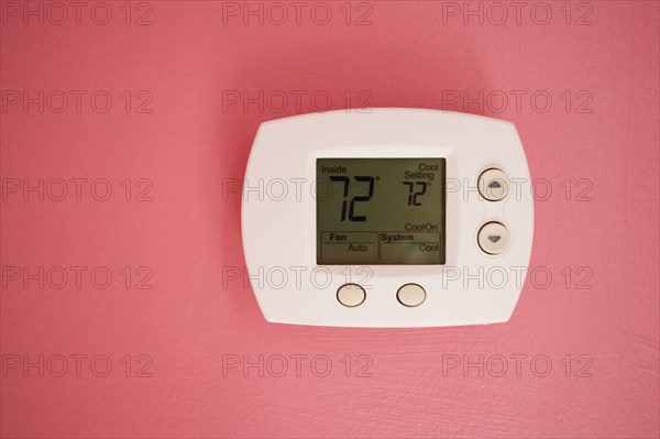 Wall thermostat at 72 degrees Fahrenheit