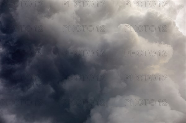 Dramatic gray storm clouds on sky