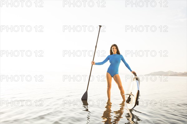 Woman wearing blue swimsuit