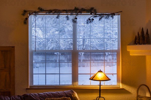 View from living room to snowy outdoors