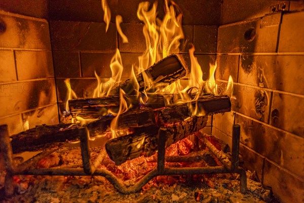 Close-up of fireplace burning wood