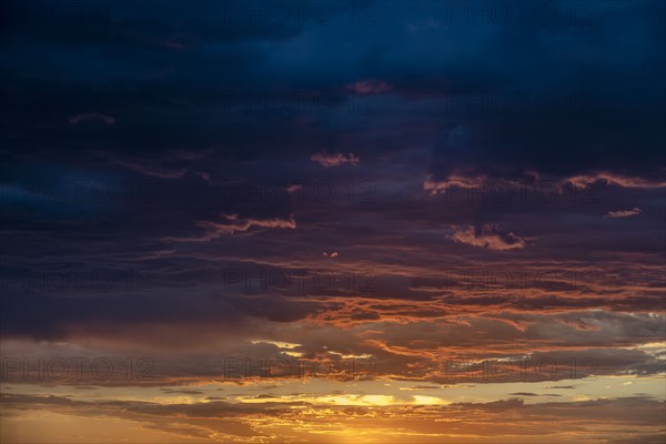 Dramatic storm clouds at sunset