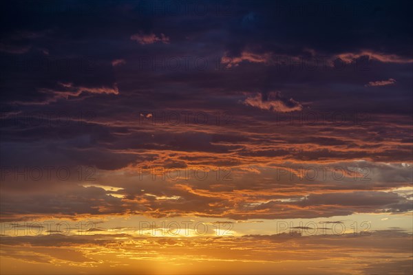 Dramatic storm clouds at sunset