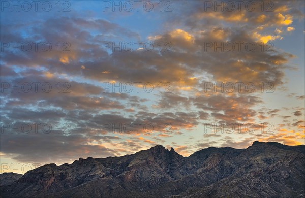 Sunset sky above desert landscape