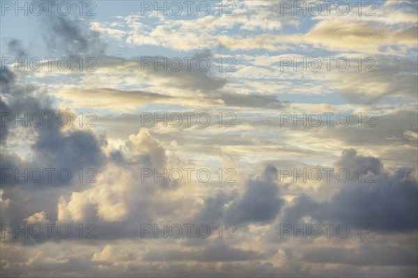 Dramatic clouds on sky at sunset