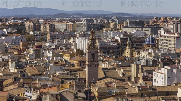 Old town buildings rooftops and church tower