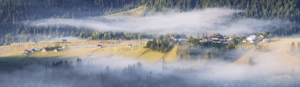 Panoramic view of rolling landscape in Carpathian Mountains