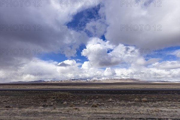 McDermitt, White clouds above desert and mountains in background