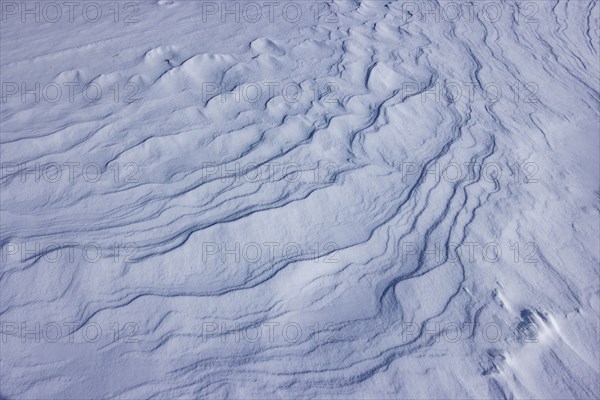 Abstract patterns on snow, full frame