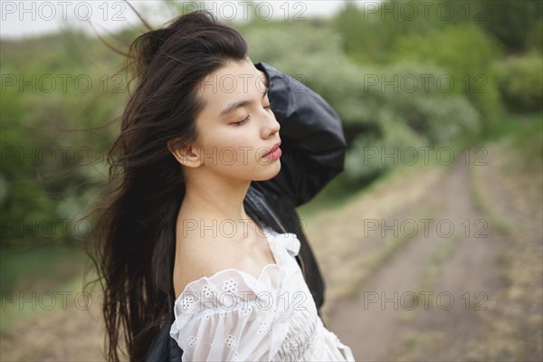 Portrait of teenage girl with closed eyes