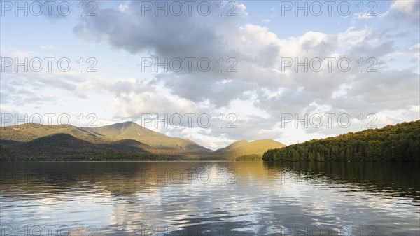 Lake Placid reflecting Whiteface Mountain and clouds