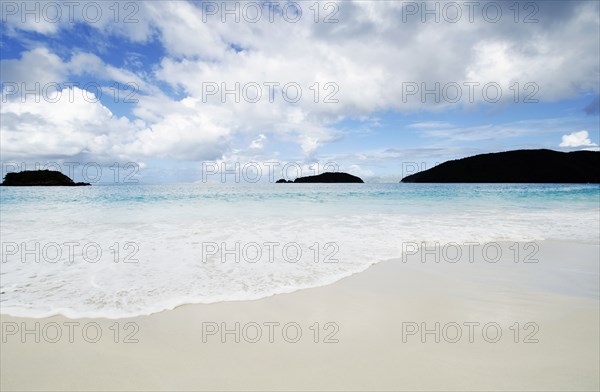 Sea wave on sandy beach at Cinnamon Bay