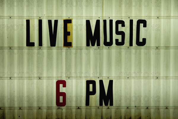 Live music signage outside honky tonk