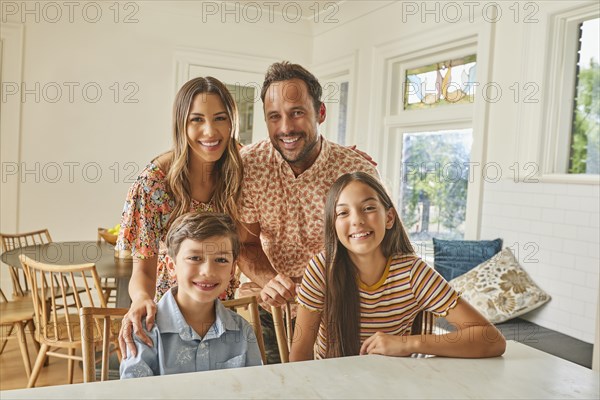 Portrait of smiling family with two children