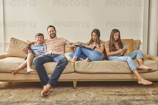 Smiling family with two children