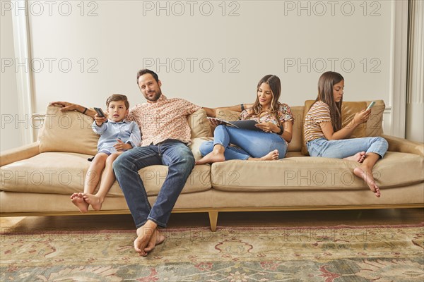 Smiling family with two children