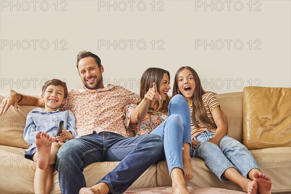 Smiling family with two children