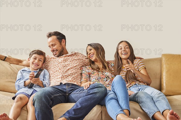 Smiling family with two children