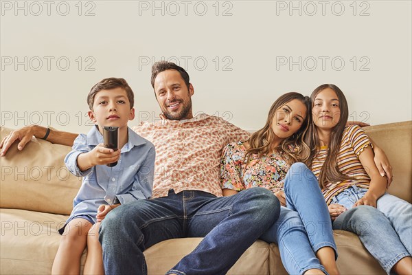 Smiling family with two children