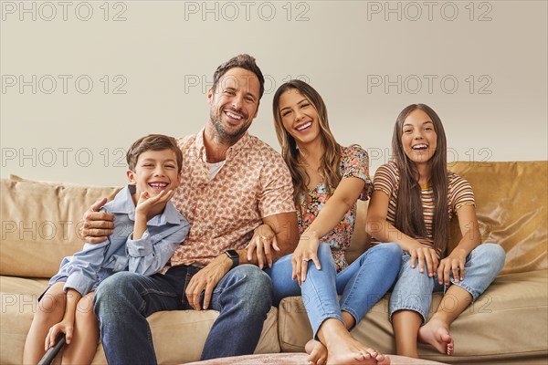 Portrait of smiling family with two children