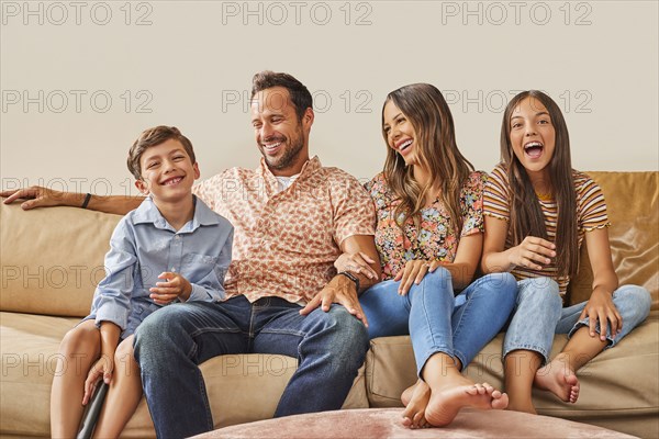 Portrait of smiling family with two children