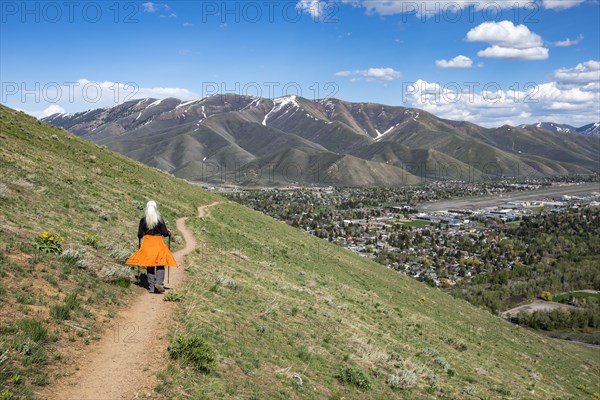 Senior blonde woman hiking on Carbonate Mountain trail