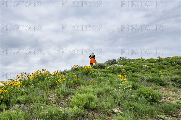 Senior blonde woman hiking on Carbonate Mountain trail