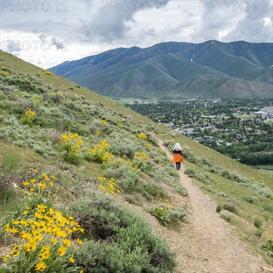 Senior blonde woman hiking on Carbonate Mountain trail