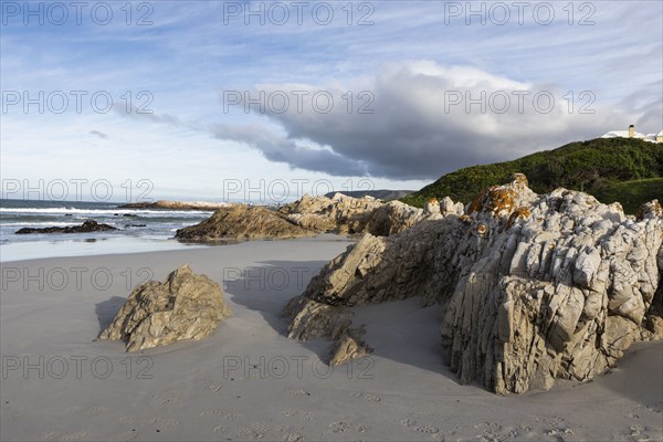 Rocky coastline of Atlantic Ocean in Voelklip Beach