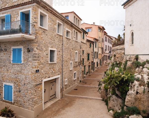 Houses with blue shutters in old town