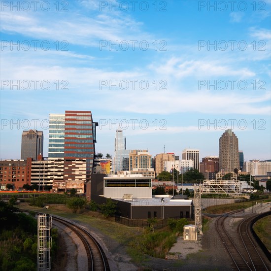 City skyline against blue sky