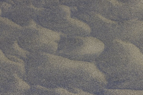 Wind sculpted patterns in beach sand