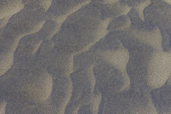 Wind sculpted patterns in beach sand