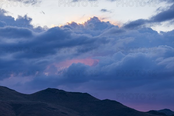 Beautiful dawn over silhouettes of mountains