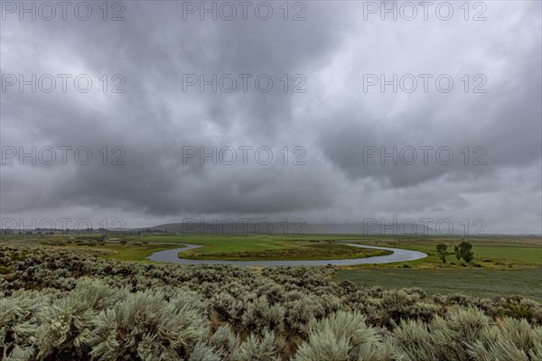 Heavy storm clouds over oxbow bend