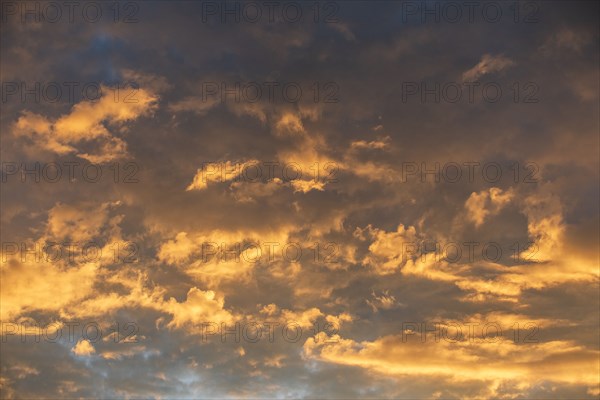 Clouds illuminated by setting sun