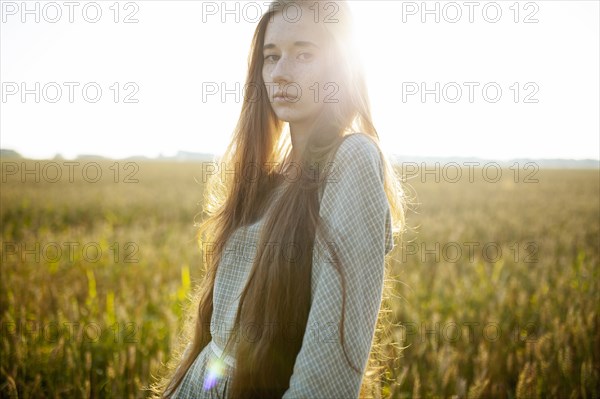 Beautiful woman posing in rural area