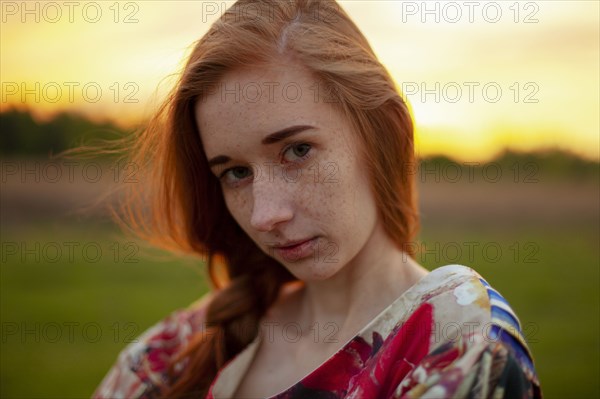 Beautiful woman posing in rural area