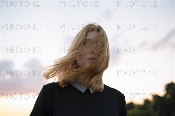 Portrait of mystery woman at sunset