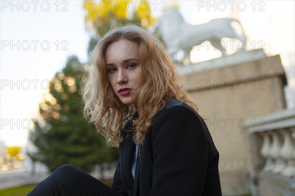 Portrait of serious woman looking at camera