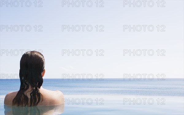 Woman in swimming pool, US Virgin Islands, USA