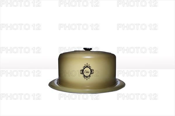 Studio shot of old fashioned cake plate and cover