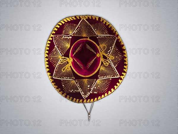 Overhead view of Mexican sombrero against white background