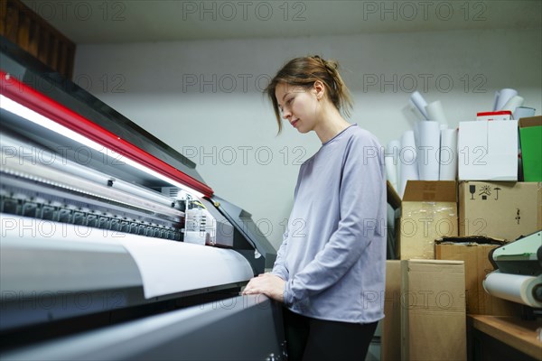 Woman working in printing studio
